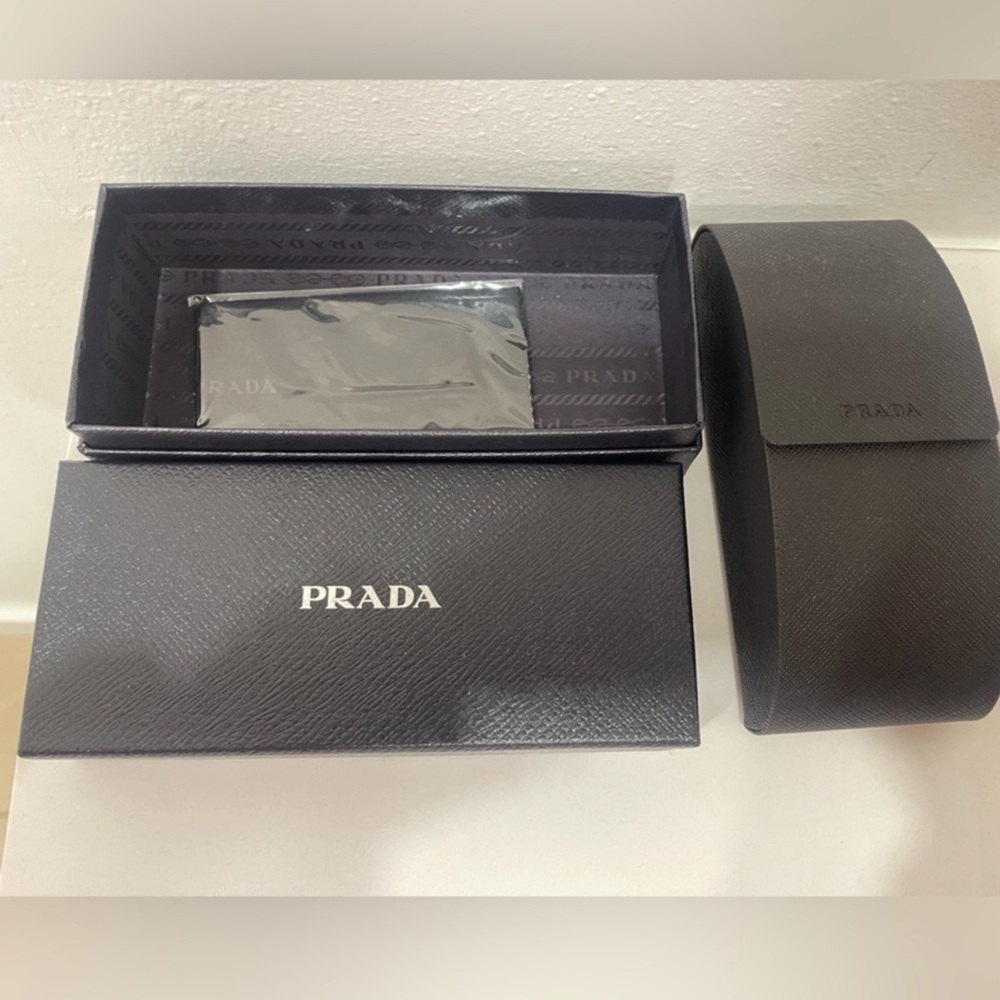 Unisex Prada black eyeglass case, box and cleaning wipe. Brand new